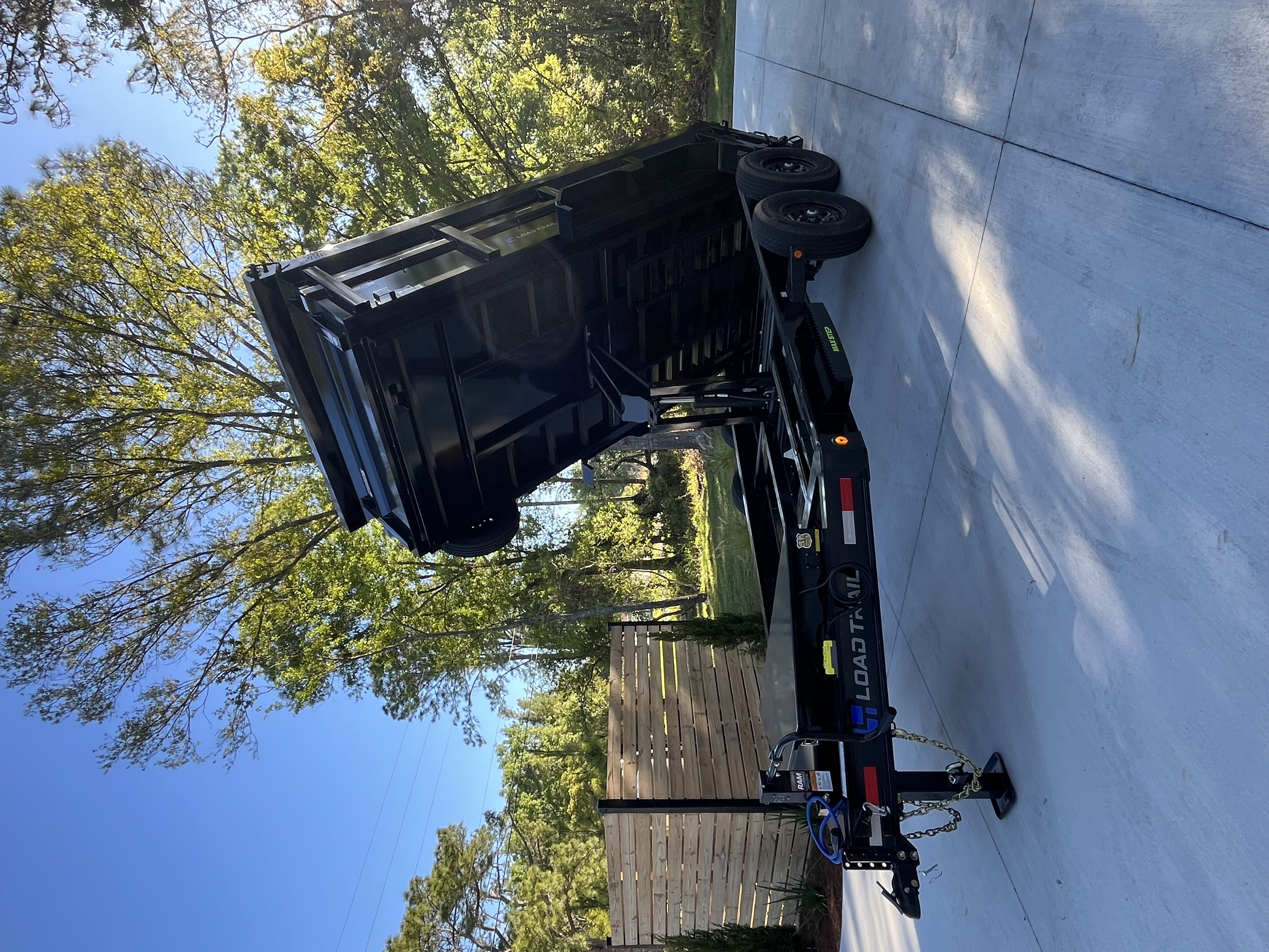 14ft Load Trail Dump Trailer - Angle View with Bed Raised