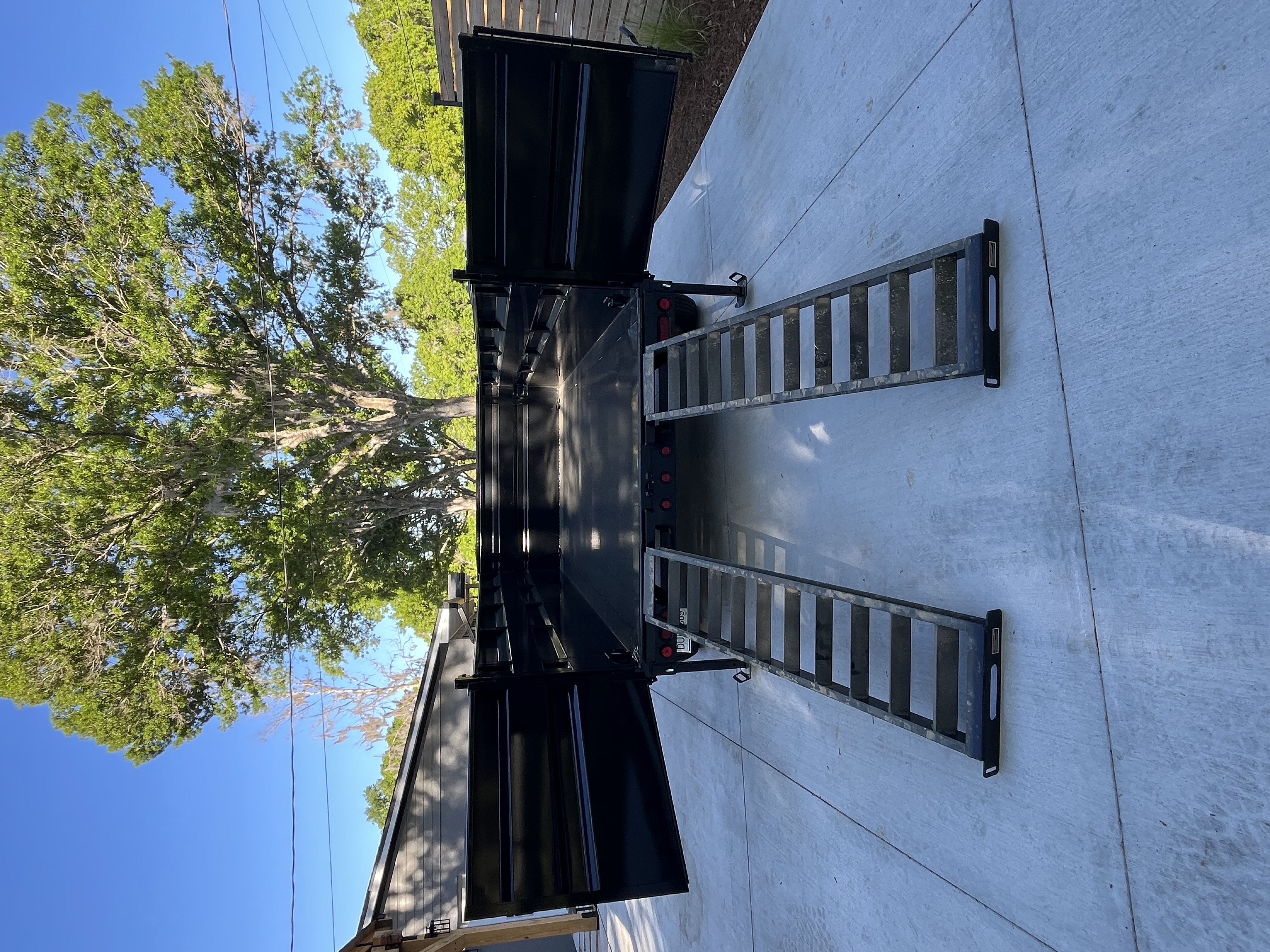 14ft Load Trail Dump Trailer - Rear View with Loading Ramps